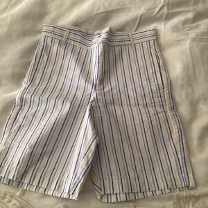 Bella Bliss size 12 fits best as a 10/12 blue/yellow seer sucker striped short